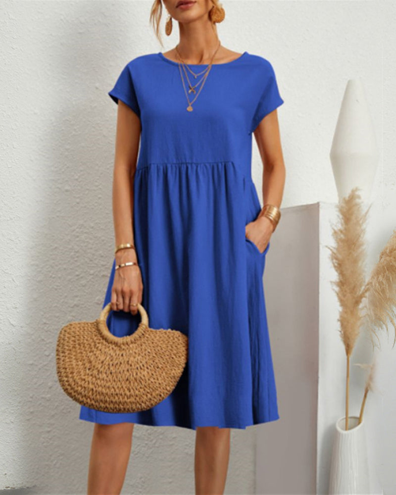 Comodo abito midi con scollo tondo e tasche