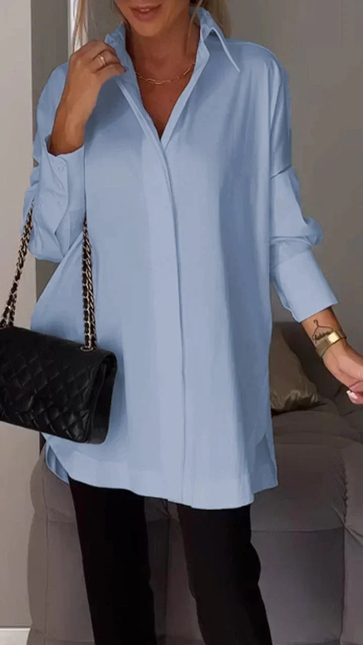 Elegante camicetta oversize con manicure arrotolata