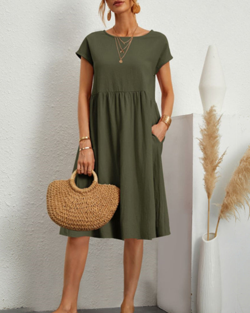 Comodo abito midi con scollo tondo e tasche