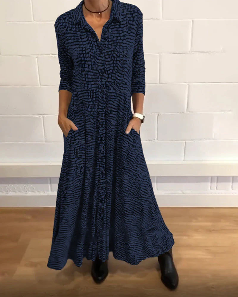 Eleanora - elegante abito lungo a trapezio con tasche e dettagli abbottonati