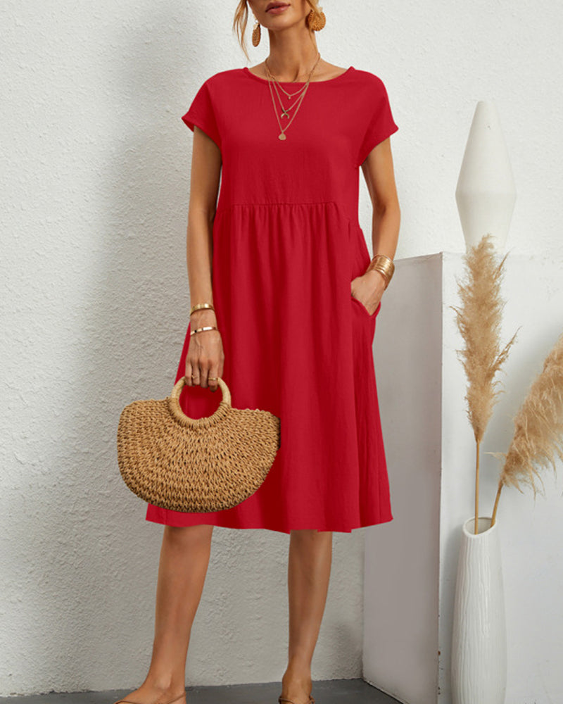 Comodo abito midi con scollo tondo e tasche