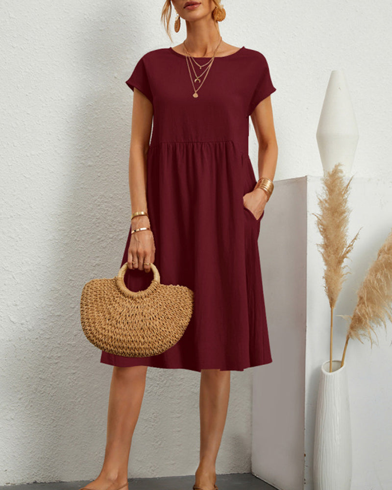 Comodo abito midi con scollo tondo e tasche