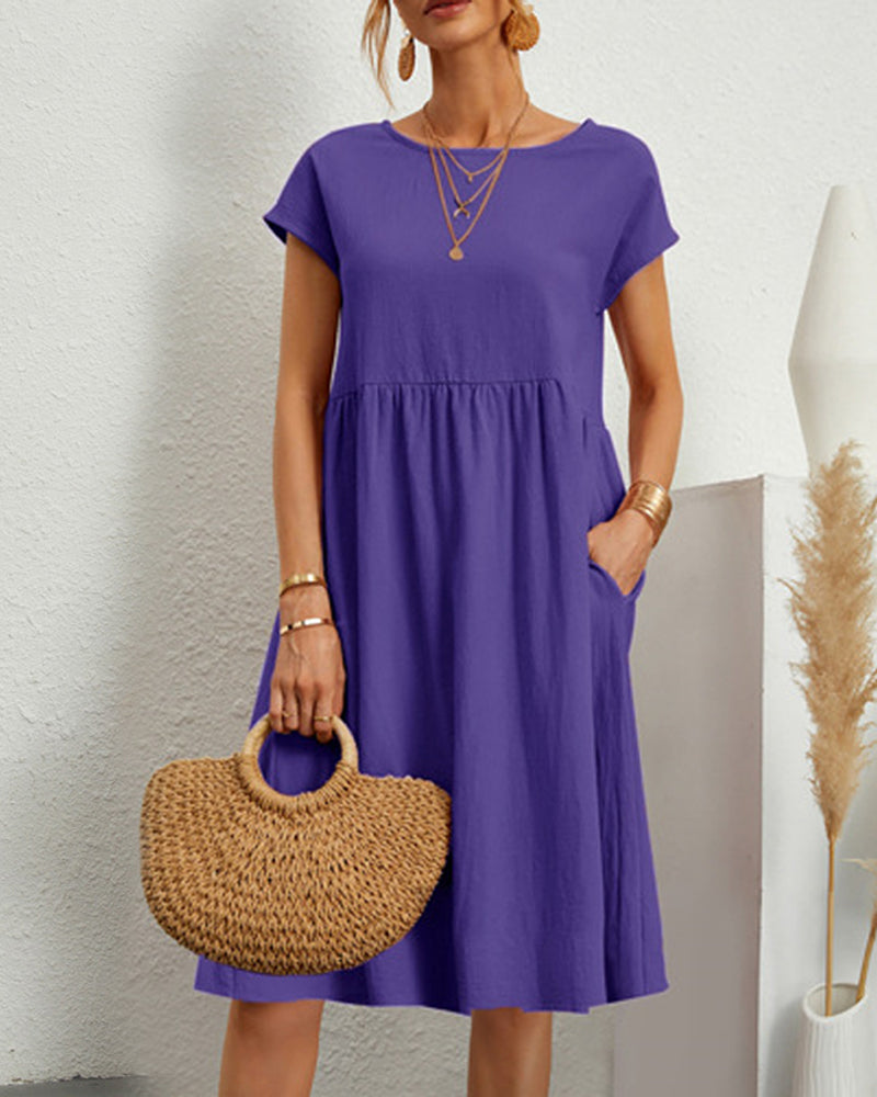 Comodo abito midi con scollo tondo e tasche