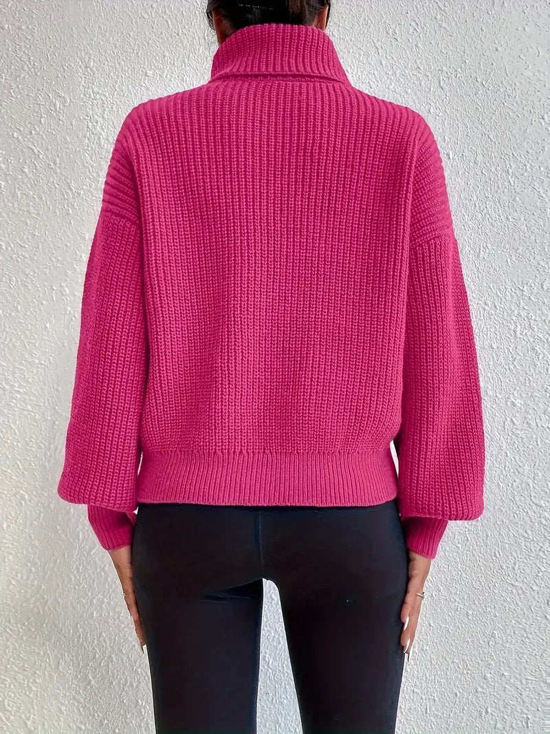 Maglia chic con spalle scese, maniche a lanterna e collo a rollino