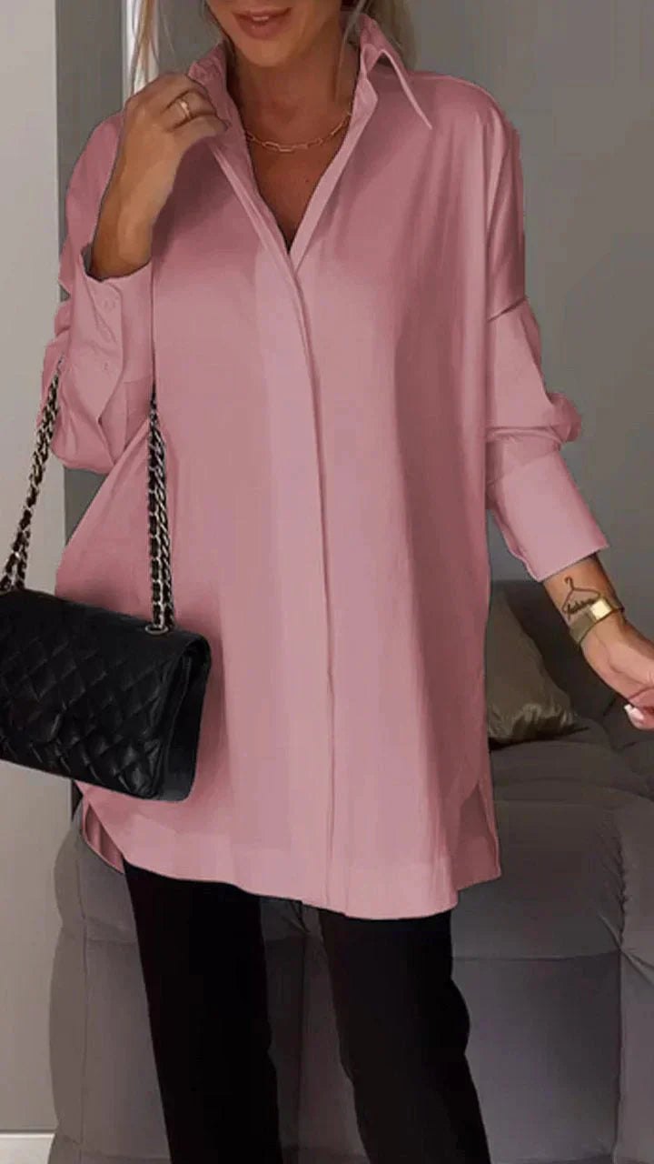 Elegante camicetta oversize con manicure arrotolata