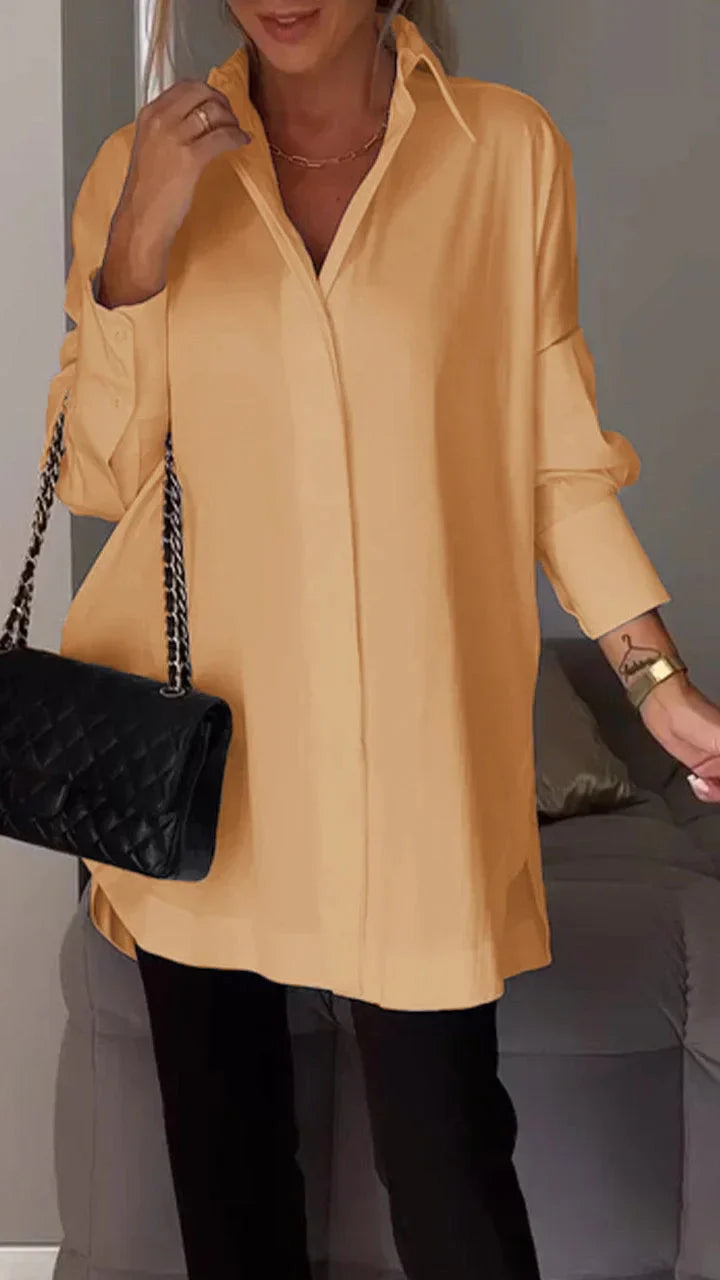 Elegante camicetta oversize con manicure arrotolata