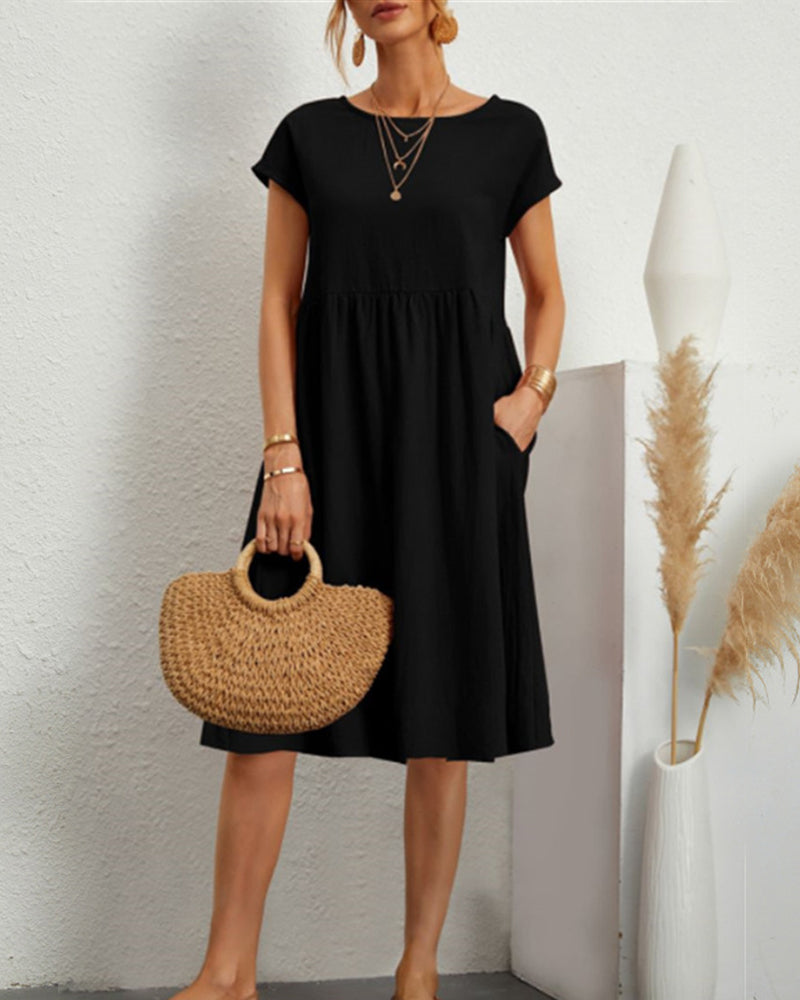 Comodo abito midi con scollo tondo e tasche