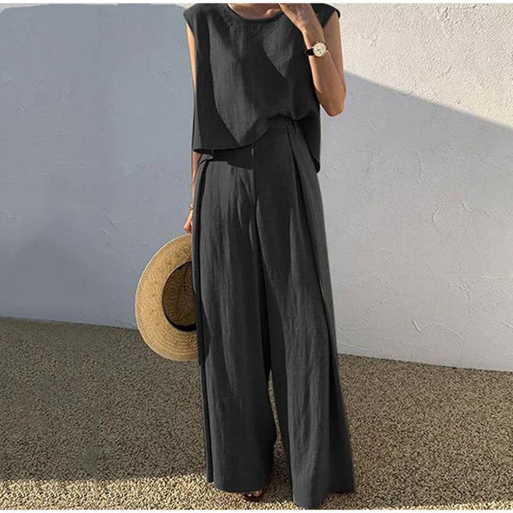 Pantaloni di lino puliti con pantaloni dal taglio largo e top con o -Ausschnitt