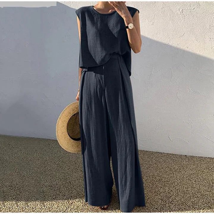 Pantaloni di lino puliti con pantaloni dal taglio largo e top con o -Ausschnitt