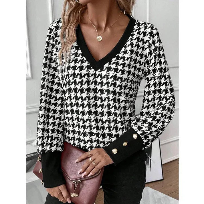 Isabelle moreau | elegante scollo a V maniche lunghe