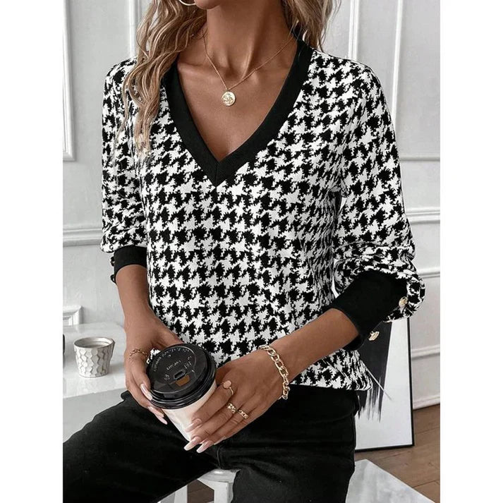 Isabelle moreau | elegante scollo a V maniche lunghe