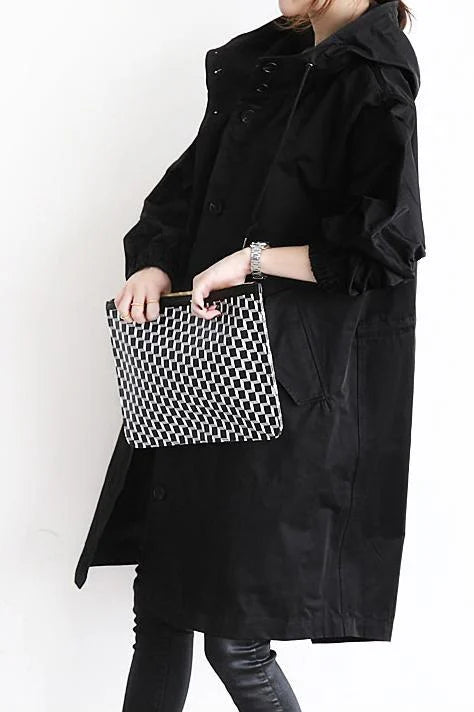 Impermeabile oversize con scudo urbano e trend setter