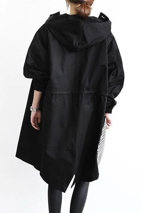 Impermeabile oversize con scudo urbano e trend setter