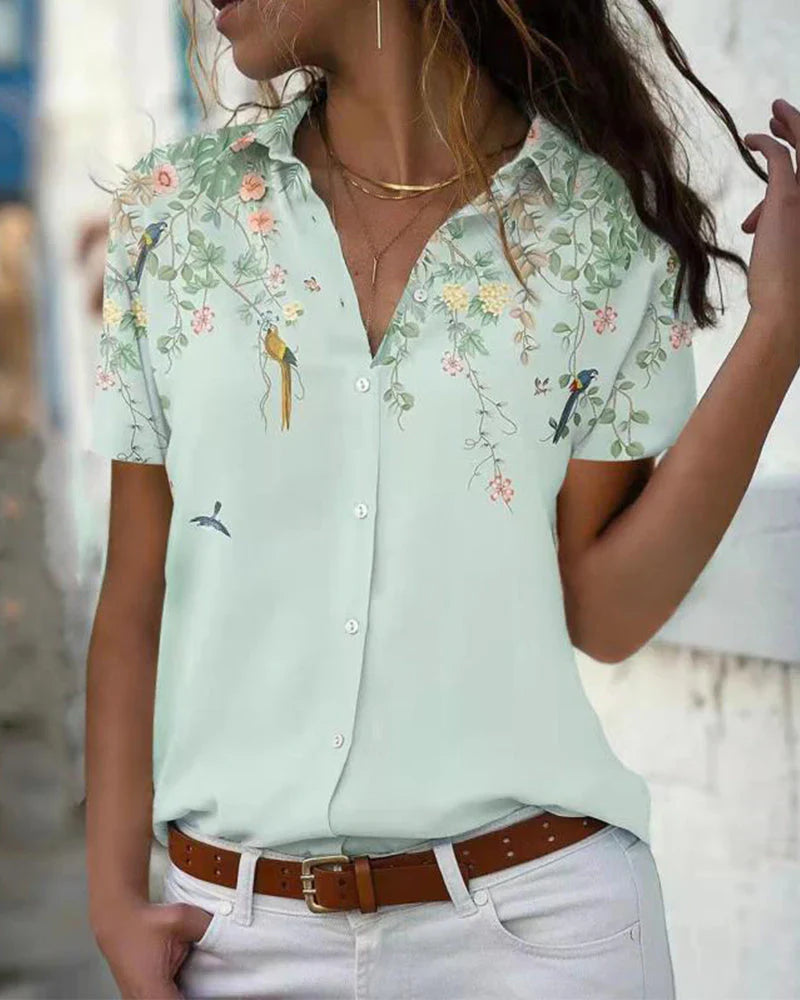 Elissa - blusa chic con motivo floreale e colletto classico