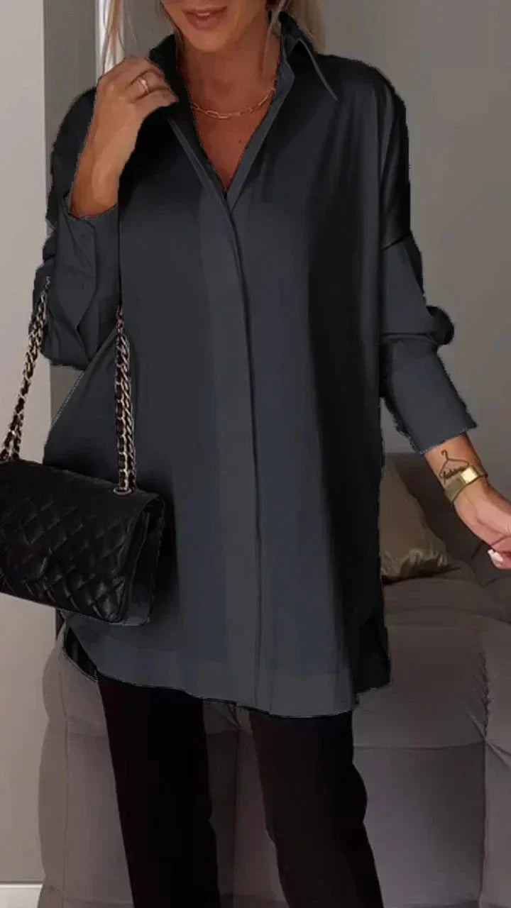 Elegante camicetta oversize con manicure arrotolata