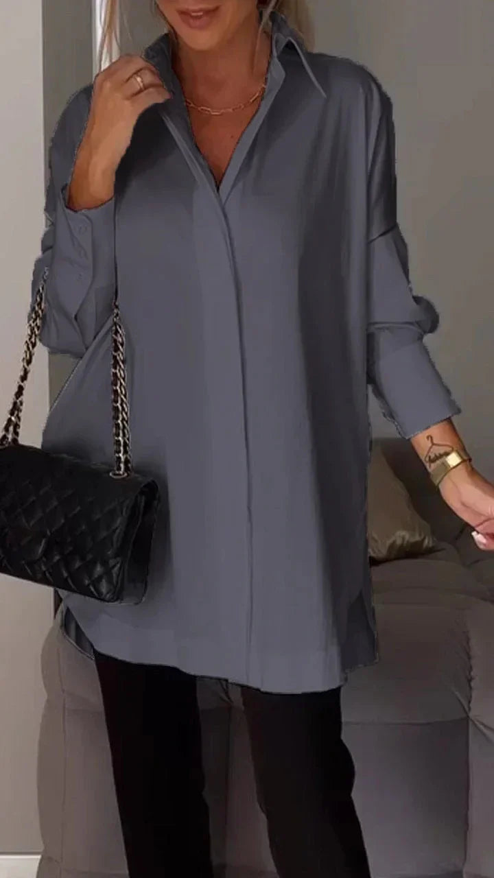 Elegante camicetta oversize con manicure arrotolata