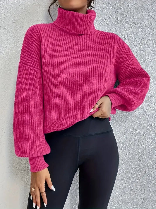 Maglia chic con spalle scese, maniche a lanterna e collo a rollino