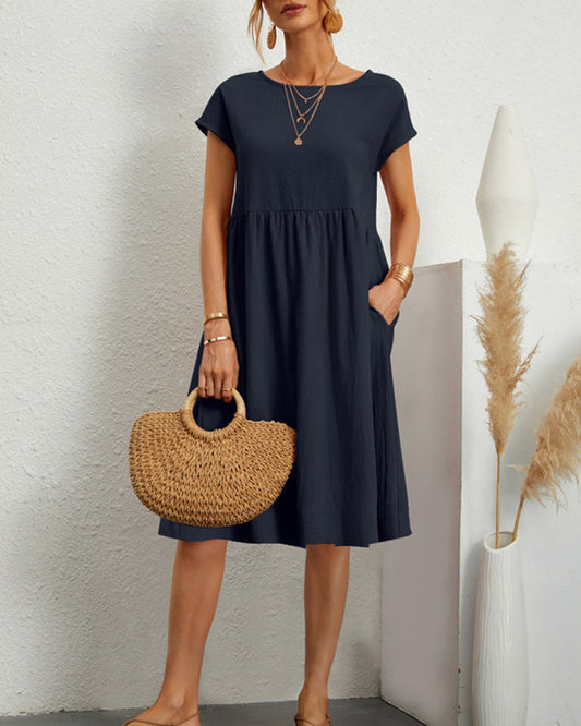 Comodo abito midi con scollo tondo e tasche