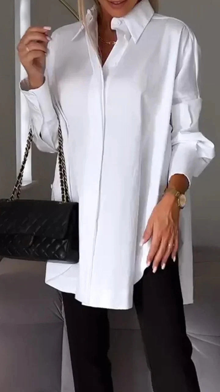Elegante camicetta oversize con manicure arrotolata
