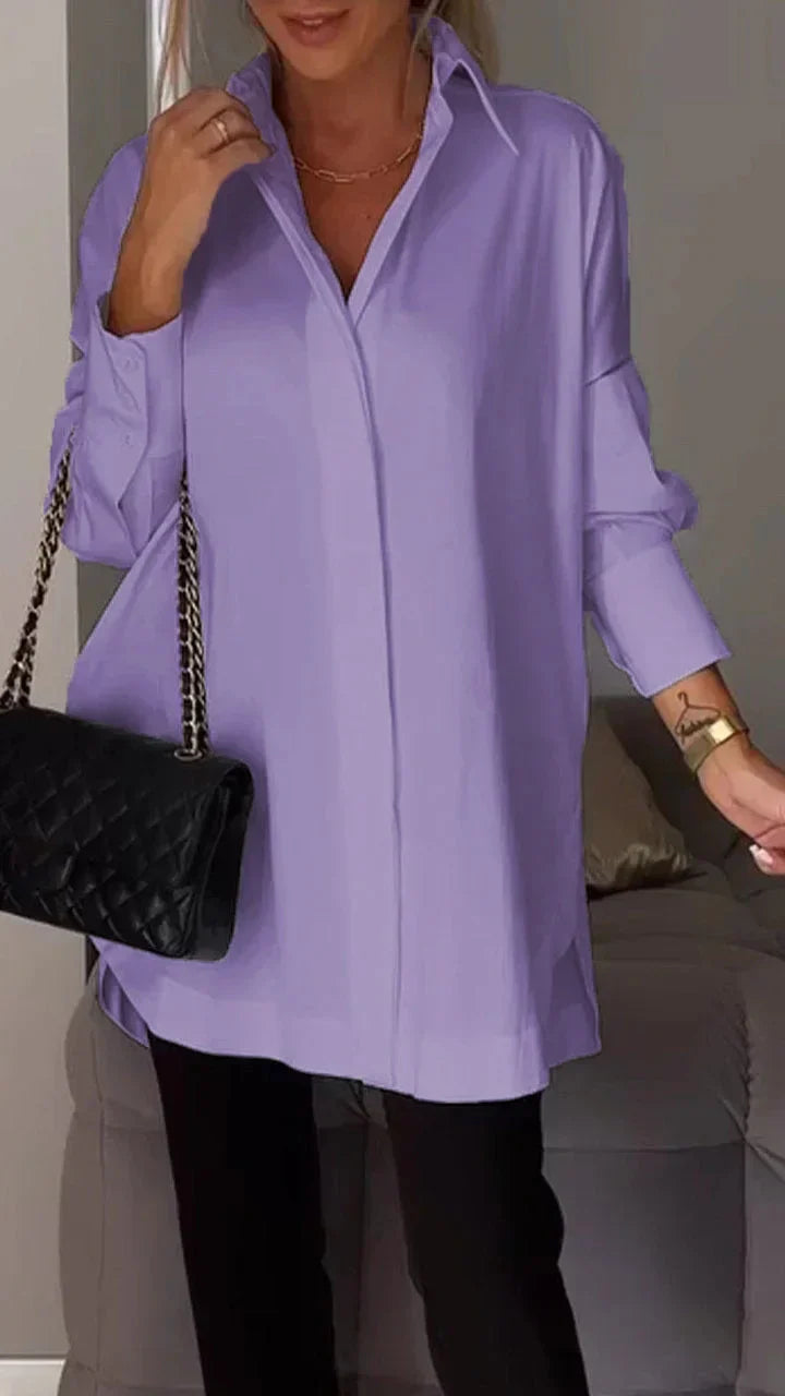 Elegante camicetta oversize con manicure arrotolata