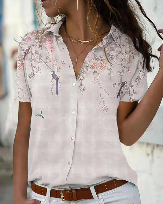 Elissa - blusa chic con motivo floreale e colletto classico
