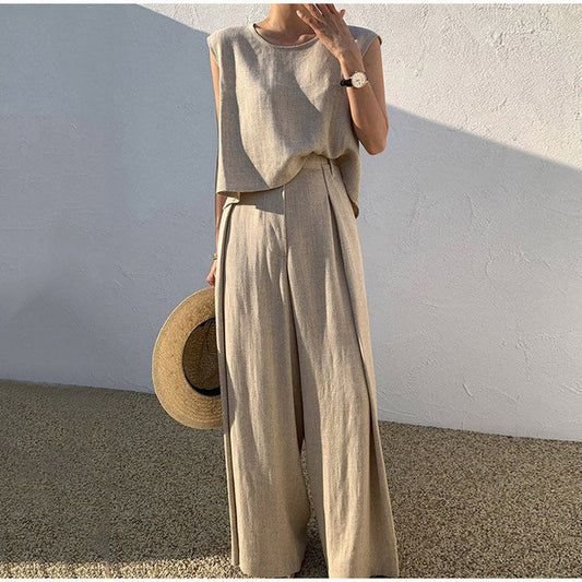 Pantaloni di lino puliti con pantaloni dal taglio largo e top con o -Ausschnitt