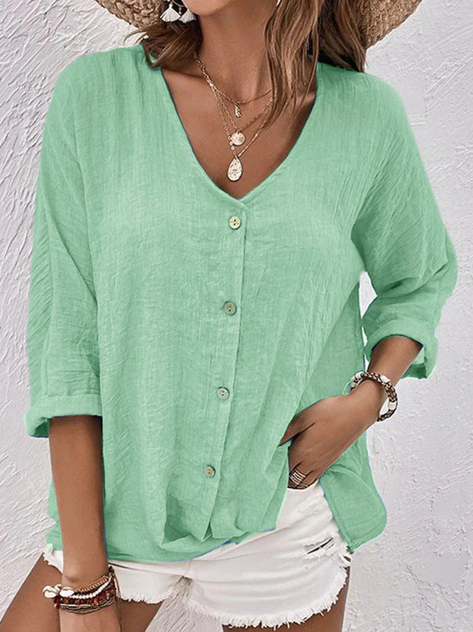 Clara - camicia blu in lino con scollo a V